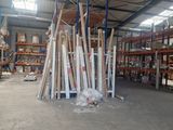 a large warehouse filled with lots of shelves and pallets