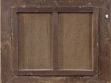 an old window with a wooden frame on the outside