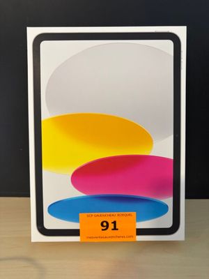 une image représentant une boîte sur laquelle figure un iPad d'Apple
