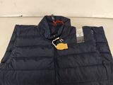 a close up of a blue vest with a tag on it