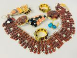 an assortment of jewelry including rings, bracelets, and rings