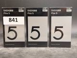 three boxes of black and white numbers on a gray surface