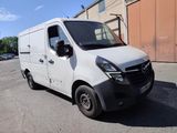 a picture of a white van parked in a parking lot