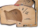 a clock made of wood with roman numerals on it