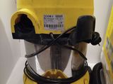 a yellow vacuum that is sitting in a box