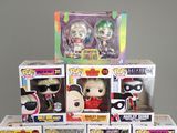 a lot of pop vinyl figures on display in the box