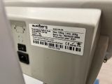 a close up of a sewing machine with a label on it