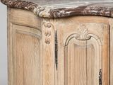 a wooden cabinet with a marble top on a grey background