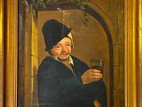 tableau représentant un homme tenant un verre de vin, dans un cadre doré