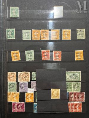 a picture of a collection of stamps on display in a glass case