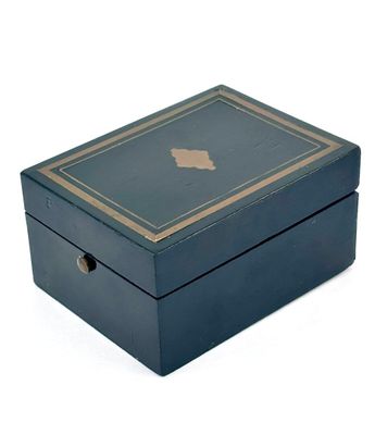 a small wooden box with a map on it
