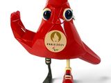 un oiseau rouge posé sur une surface blanche