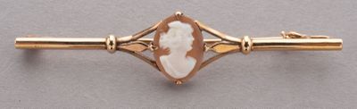 an image of a close up of a gold and white broochle broochle