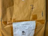 a toilet that has been wrapped in a brown paper bag