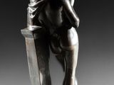 an image of a statue of a man hugging a woman