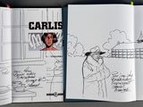 a book with a drawing of a man and a woman inside of it