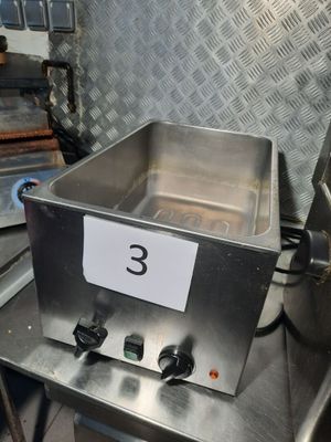 an image of a stainless steel pan with a number 3 on it