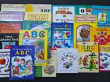 many children ' s books on the table together