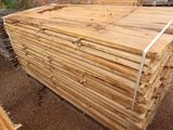 a pile of wood that is sitting on the ground