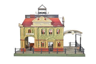 une maquette d'un bâtiment surmonté d'une horloge