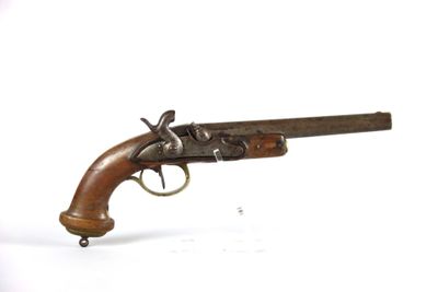 a close up of a toy gun on a white surface