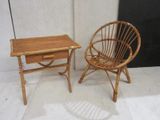 two chairs and a table in the corner of a room