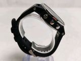 a close up of a watch on a clear stand