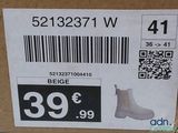 a picture of a box with a pair of boots on it