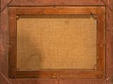 an old wooden picture frame with a brown canvas on a white background