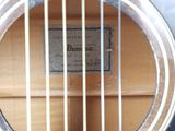 a close up of a guitar with a label on it