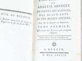 an open book with a black and white title on it