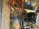 a vase with a bunch of wires in it in a garage