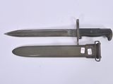 pair of knives on a white surface with a white background