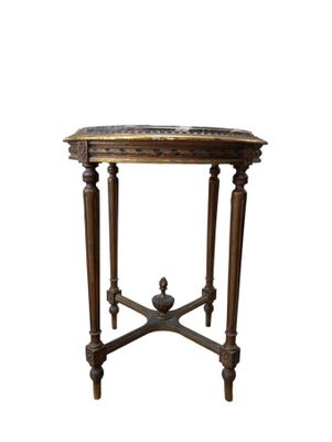 an image of a small table with a marble top on a white background