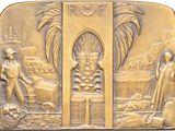 a gold plaque with a picture of a man and a woman