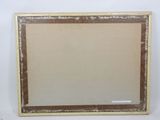 an old picture frame with a brown border on a white background