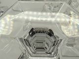 a close up view of a glass bowl with water in it