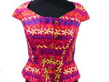 a picture of a woman ' s top on a mannequin mannequin