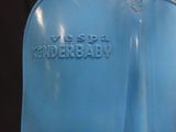 a close up of a blue vase with a name on it