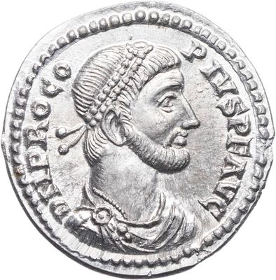 Gros plan sur une pièce de monnaie portant le visage d'un homme