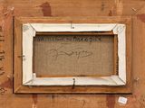an old picture of a picture frame with writing on it