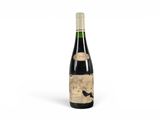 a bottle of wine sitting on top of a white surface