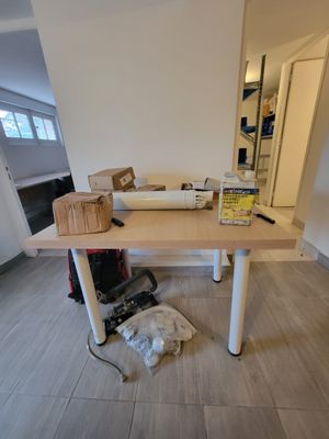 an image of a work space with a desk and a chair