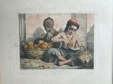 a picture of a man and a woman sitting in front of a basket of fruit