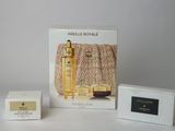 an image of a couple of boxes of perfume sitting on a table