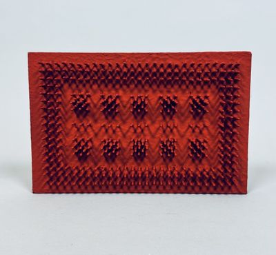 an image of a picture of a red box with a smiley face on it