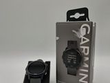 a close up of a box with a watch inside of it