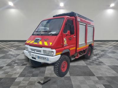a red fire truck that is parked on a checkered floor