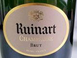 a close up of a bottle of champagne on a table