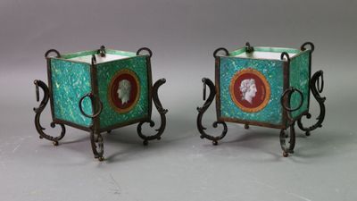 pair of green and red vases with a lady and a man on them